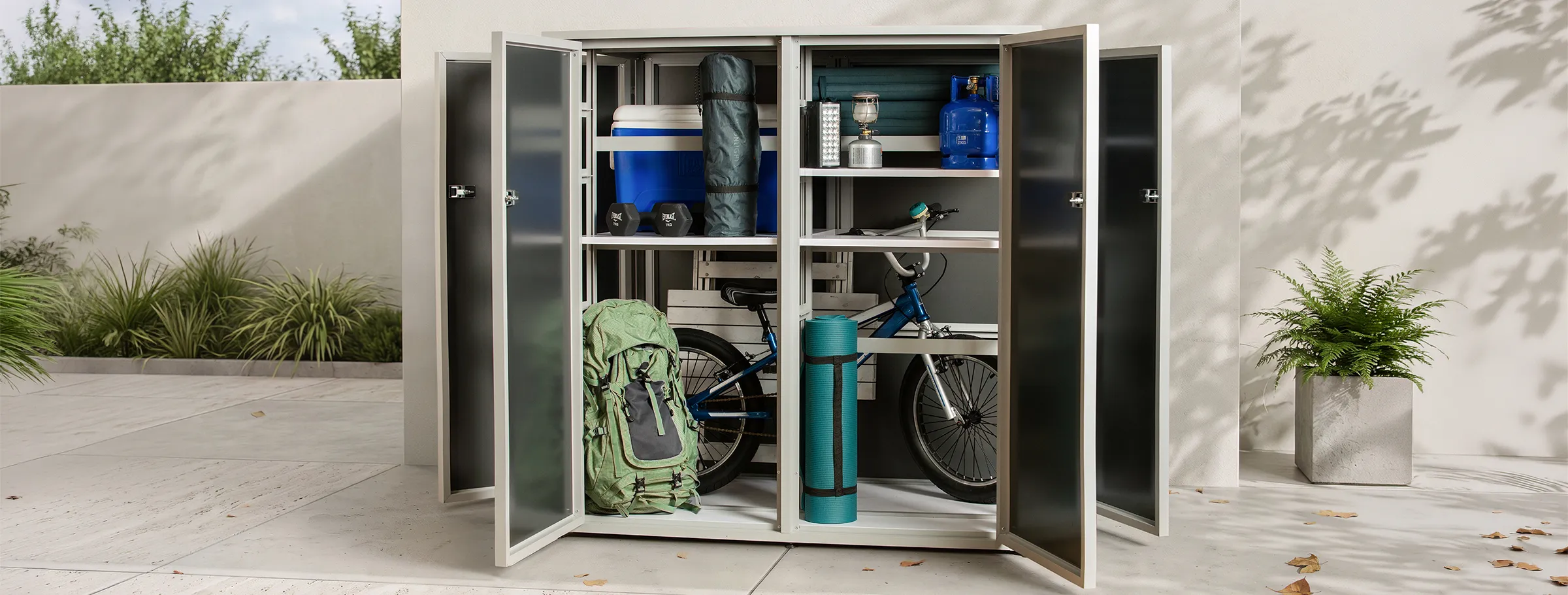 Garden S storage unit with its doors open, showing shelves packed with outdoor gear